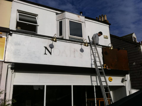 Noah's Yard take down their old signage